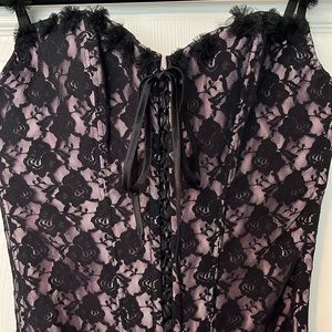 Frederick’s of Hollywood pink and black lace corset with garters